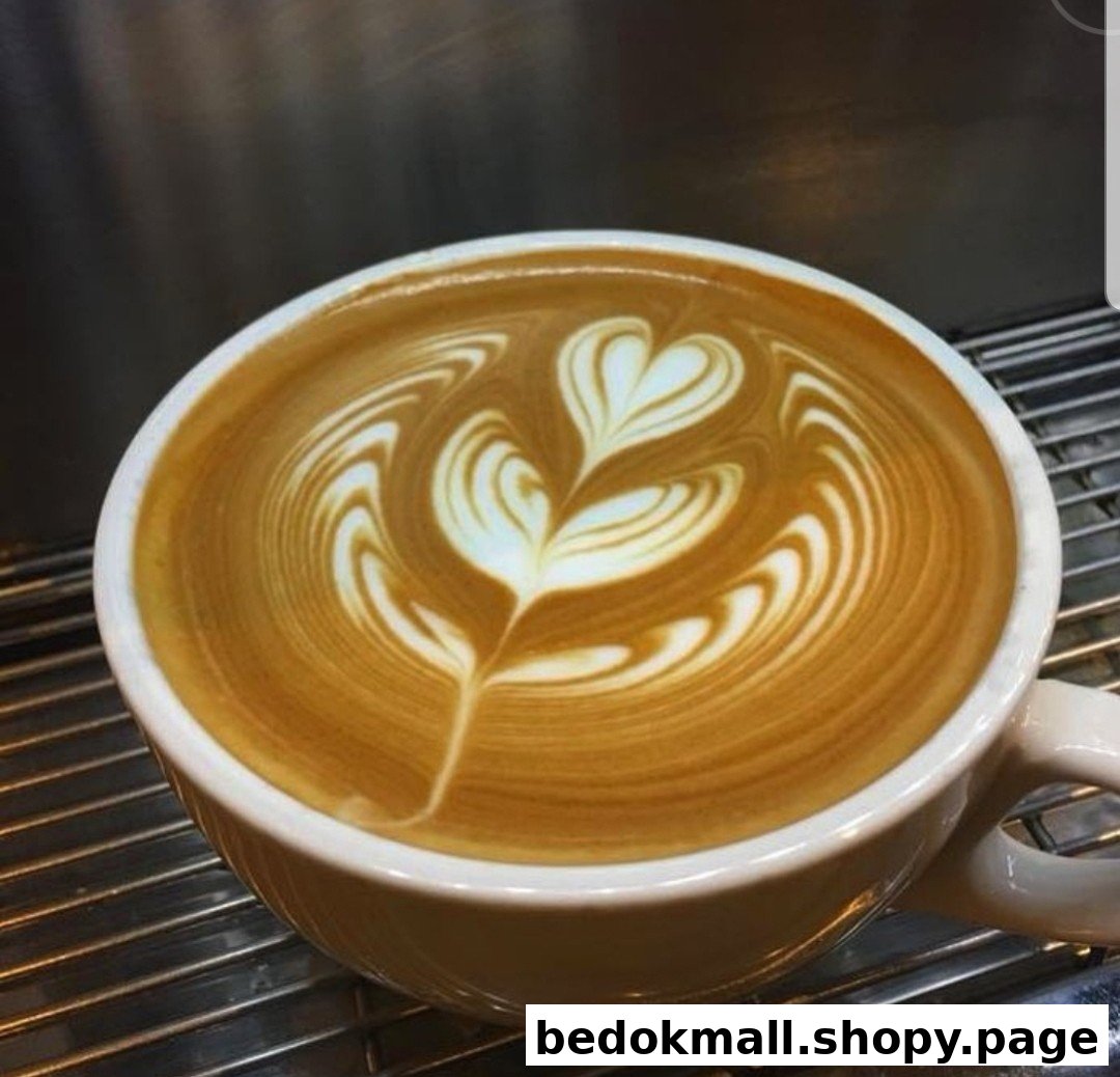 Close-up of a coffee cup with intricate latte art.