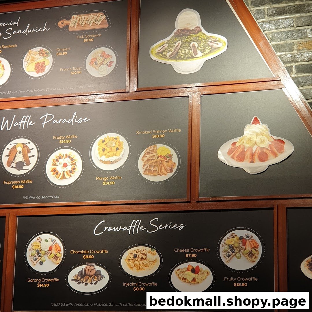 A display board showing various food items like waffles and sandwiches with prices.