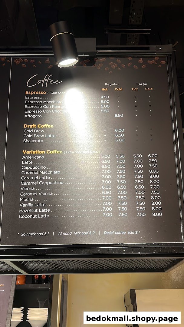 A coffee shop menu board displaying various coffee types and prices.