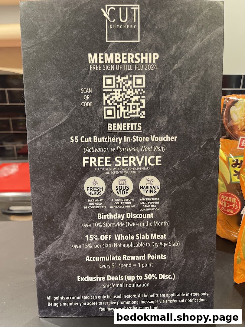 Sign detailing membership benefits and services for Cut Butchery.