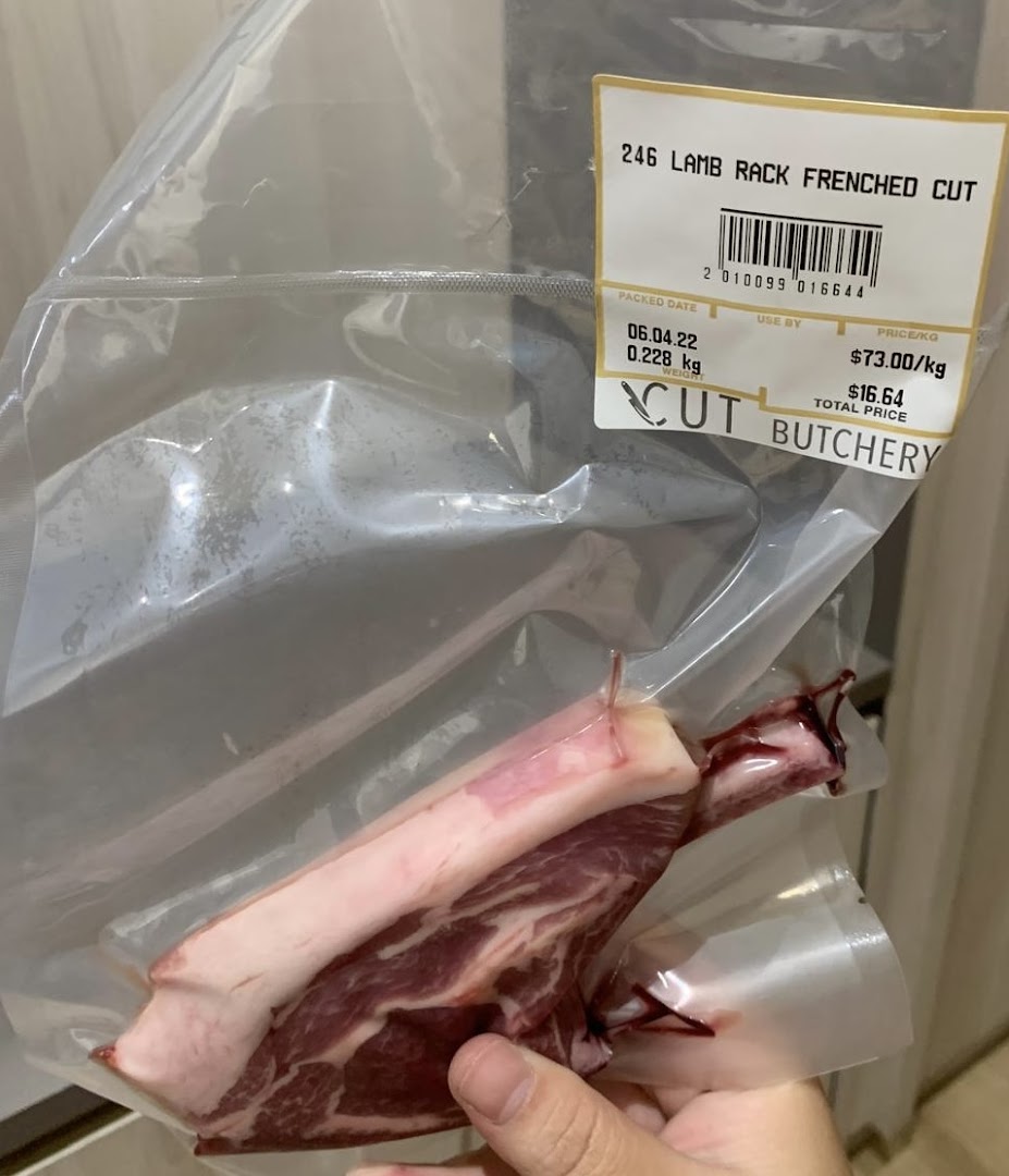 Vacuum-sealed lamb rack with a price label from Cut Butchery.