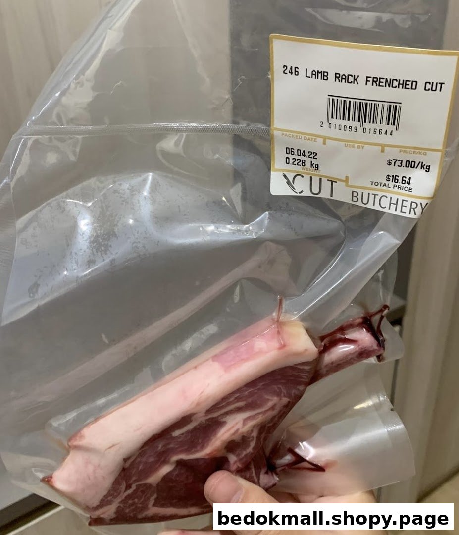 Vacuum-sealed lamb rack with a price label from Cut Butchery.