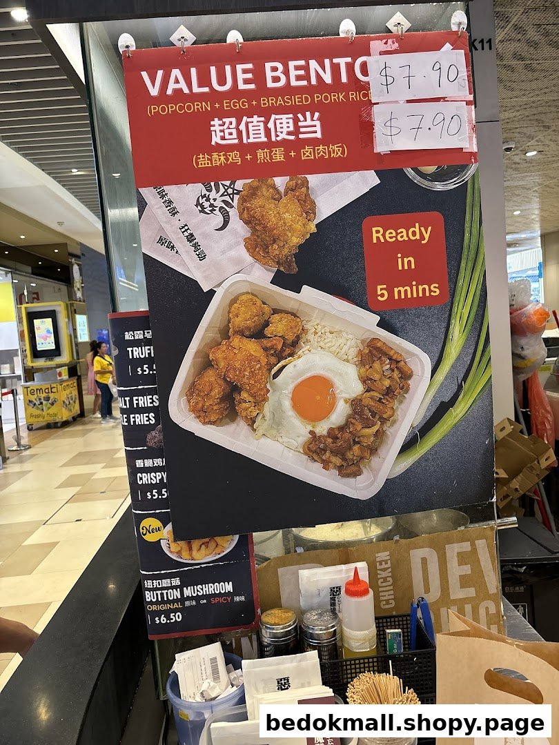 Large menu board displaying food items and prices at a counter.