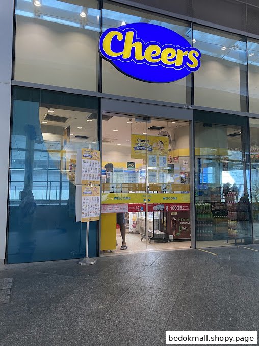 Exterior view of a Cheers convenience store entrance with prominent signage.