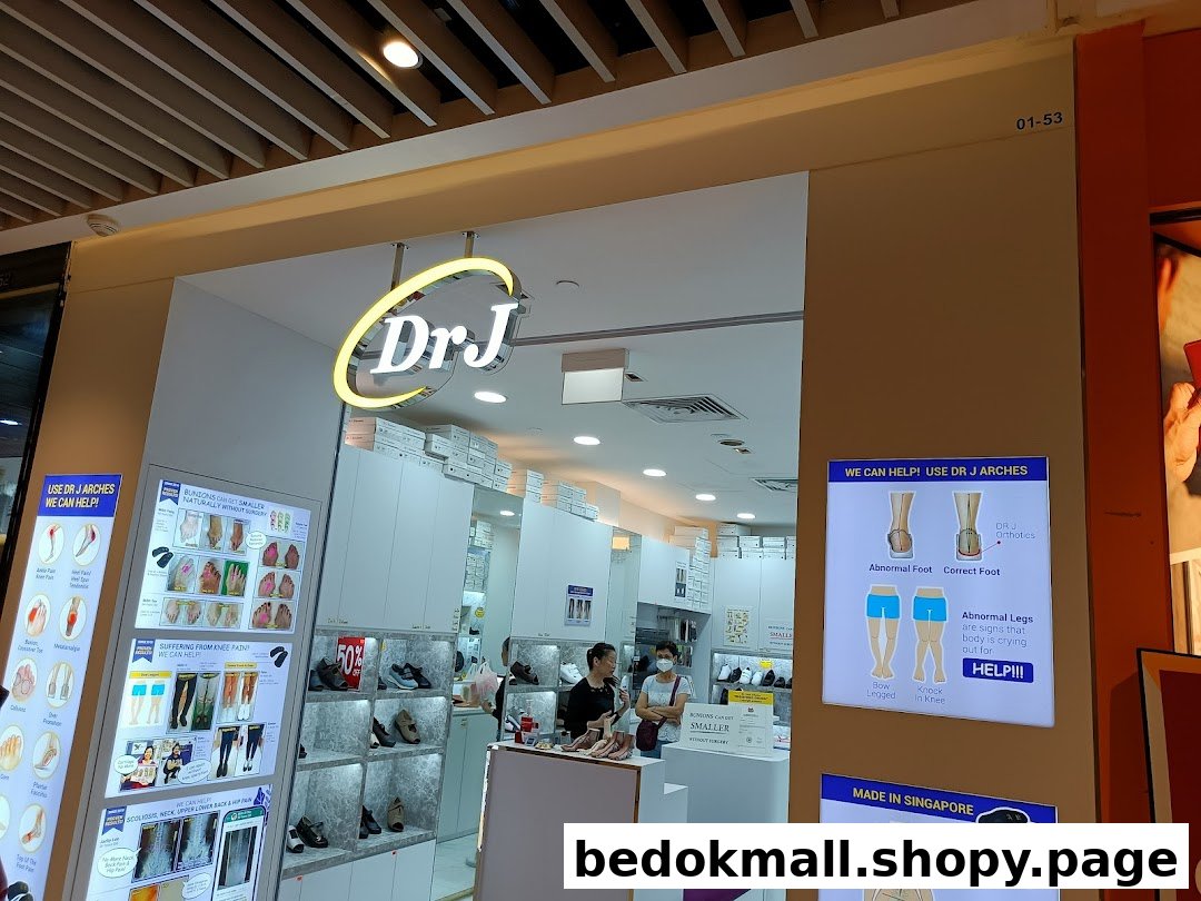 Entrance of Dr J shop with its sign and interior visible.