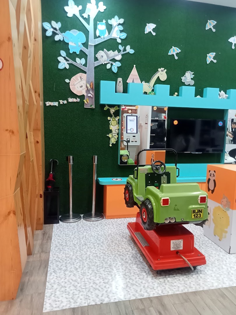 Colorful interior with cartoon animal decorations, a mirror, TV, and a ride-on toy.