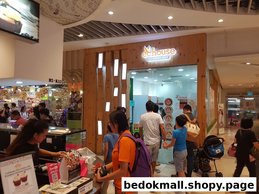Exterior view of EC House shop entrance with people entering and exiting.