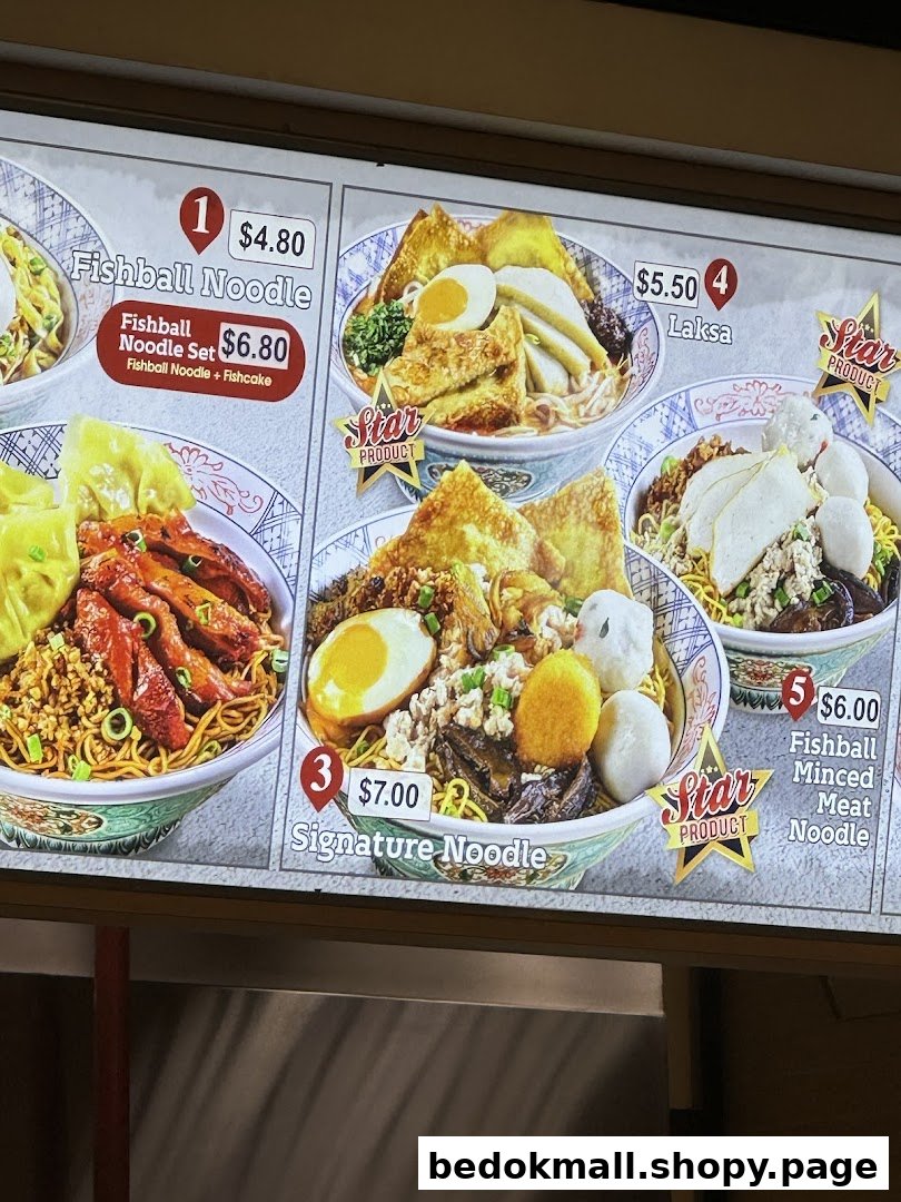 A digital menu board displaying various noodle dishes with prices.