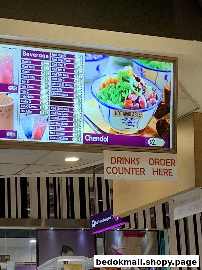 Digital menu board displaying beverages and Chendol with prices.