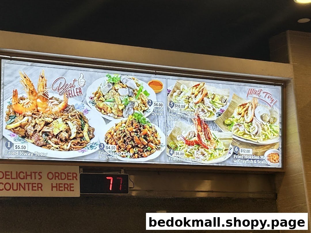 Menu board displaying various Asian dishes with prices and images.