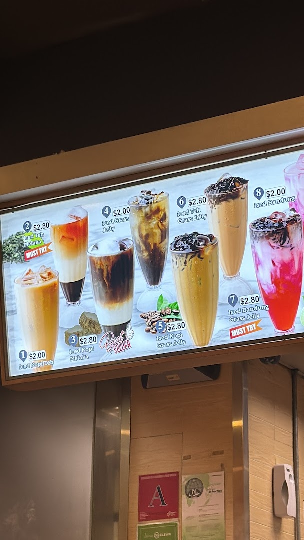 Menu board displaying various iced drinks with prices.