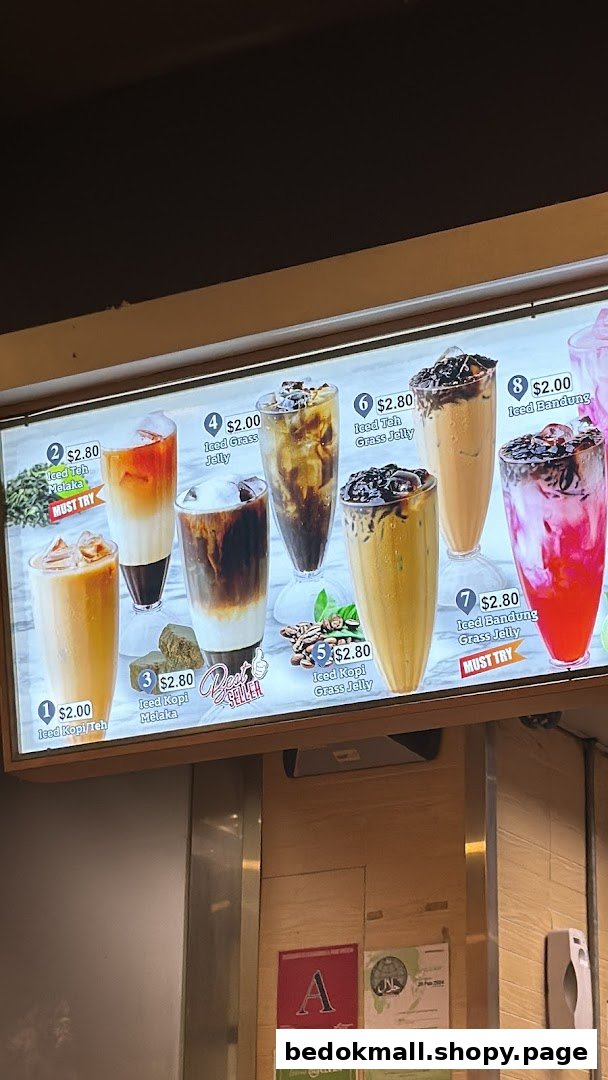 Menu board displaying various iced drinks with prices.