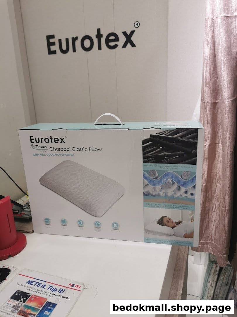 A Eurotex pillow box on a counter inside the shop with brand logo visible.
