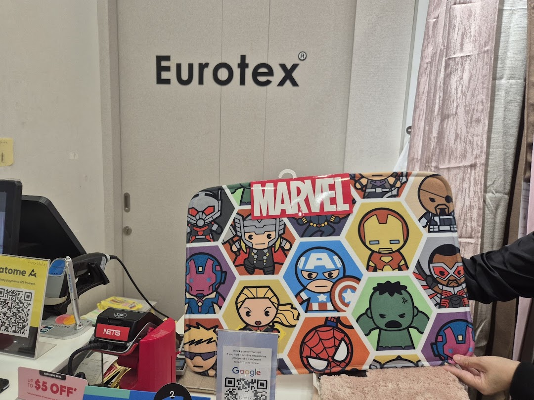 Interior shot of Eurotex shop with Marvel product and checkout counter.