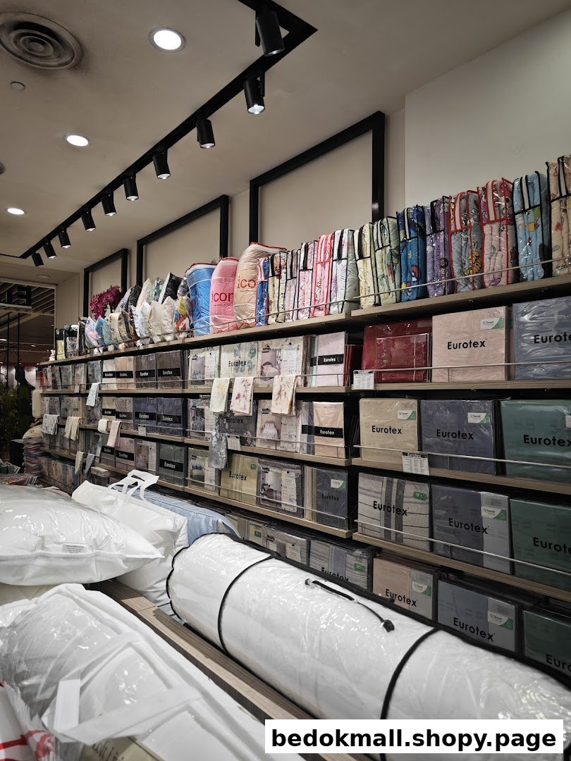Interior view of a Eurotex shop with shelves full of bedding products.
