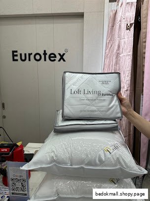 Packaged bedding products displayed inside a Eurotex shop.