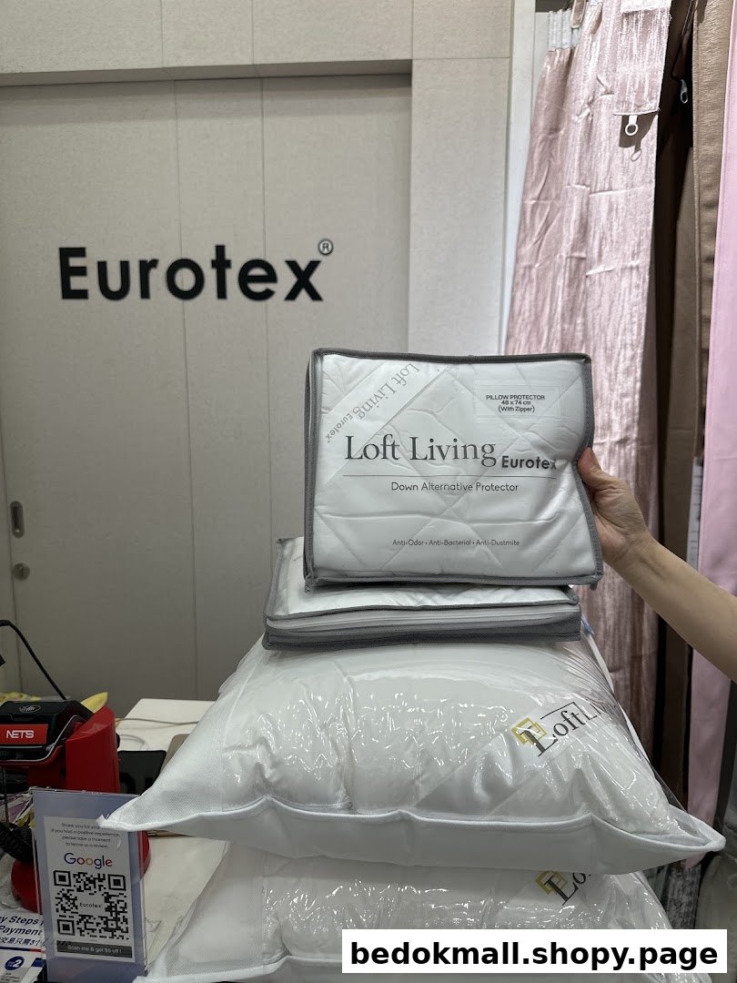Pillows and bedding products displayed inside a Eurotex shop.