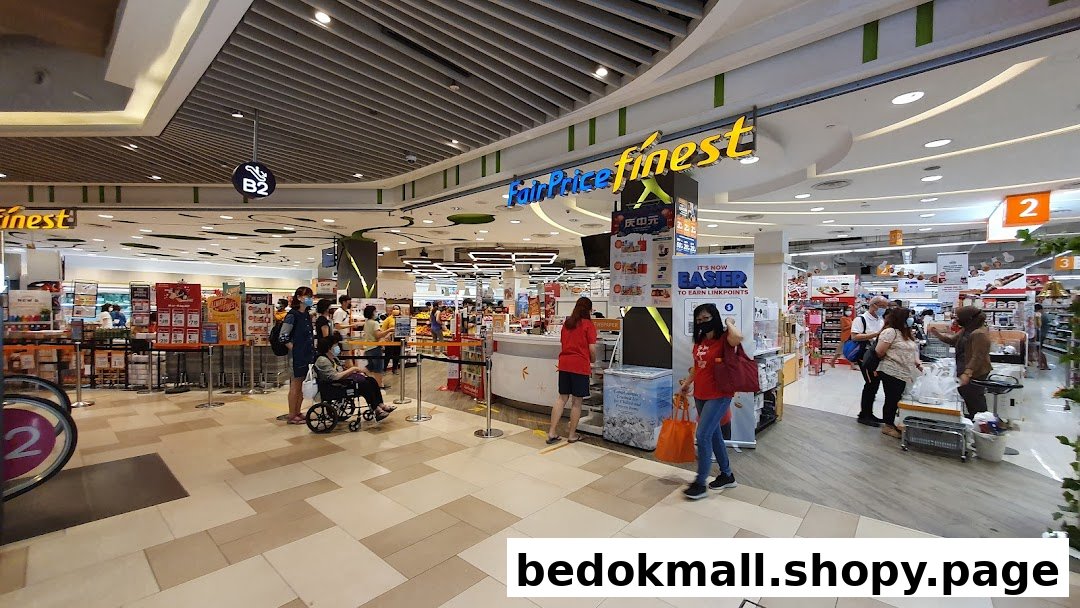 Entrance of a FairPrice Finest supermarket with people and product displays.
