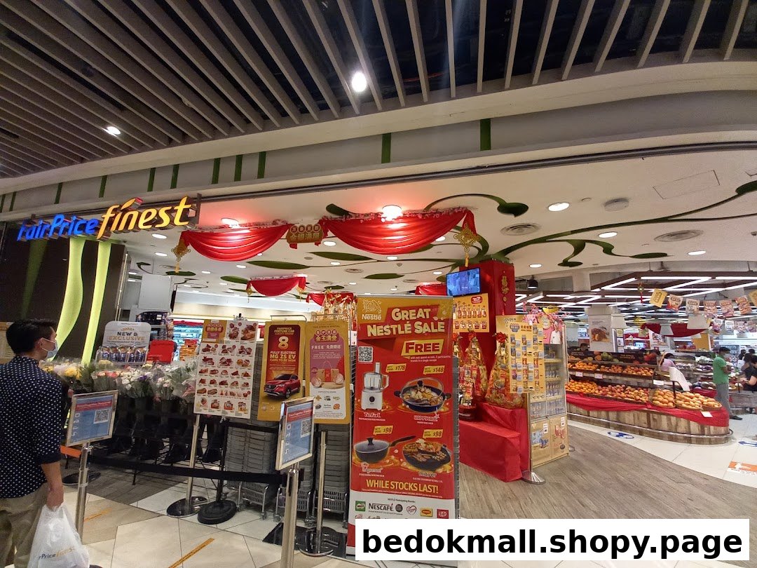 FairPrice Finest supermarket entrance with festive decorations and promotional displays.