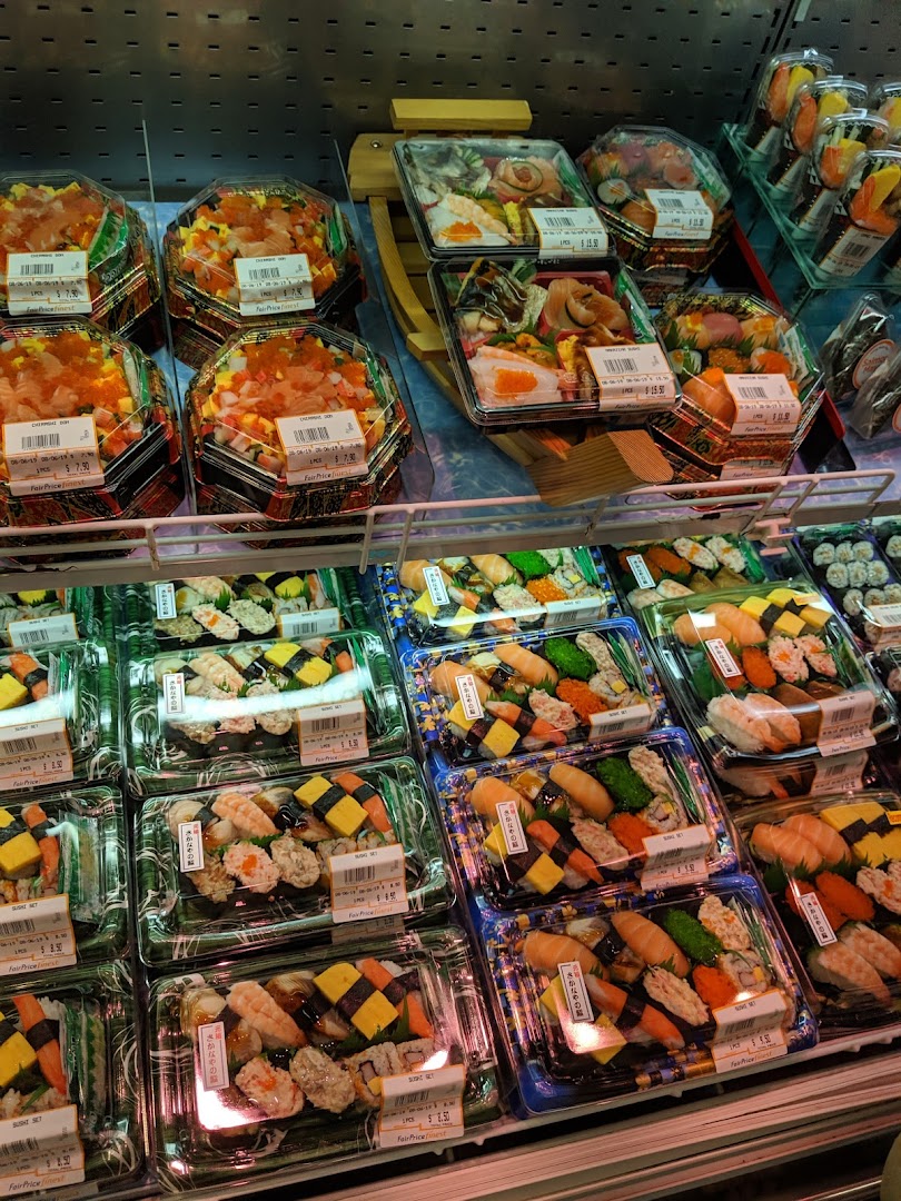 Display of various pre-packaged sushi and chirashi bowls in a refrigerated section.