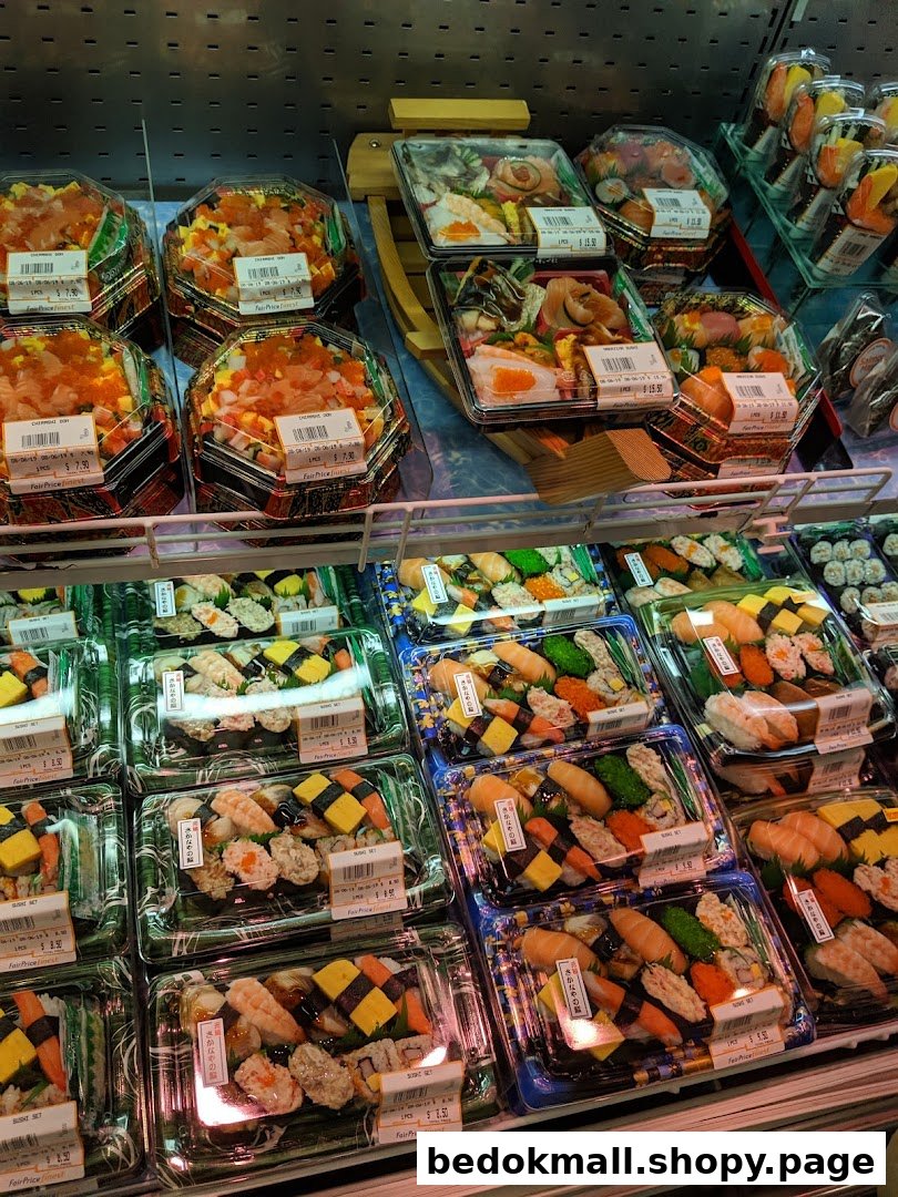 Display of various pre-packaged sushi and chirashi bowls in a refrigerated section.