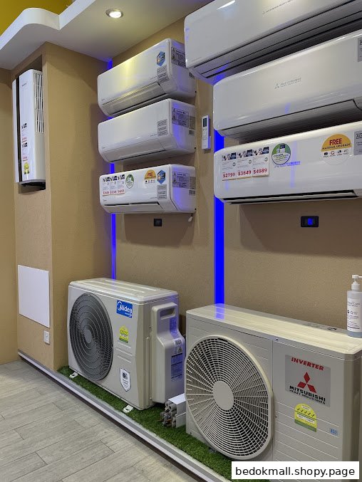 Interior display of various air conditioning units in a retail store.
