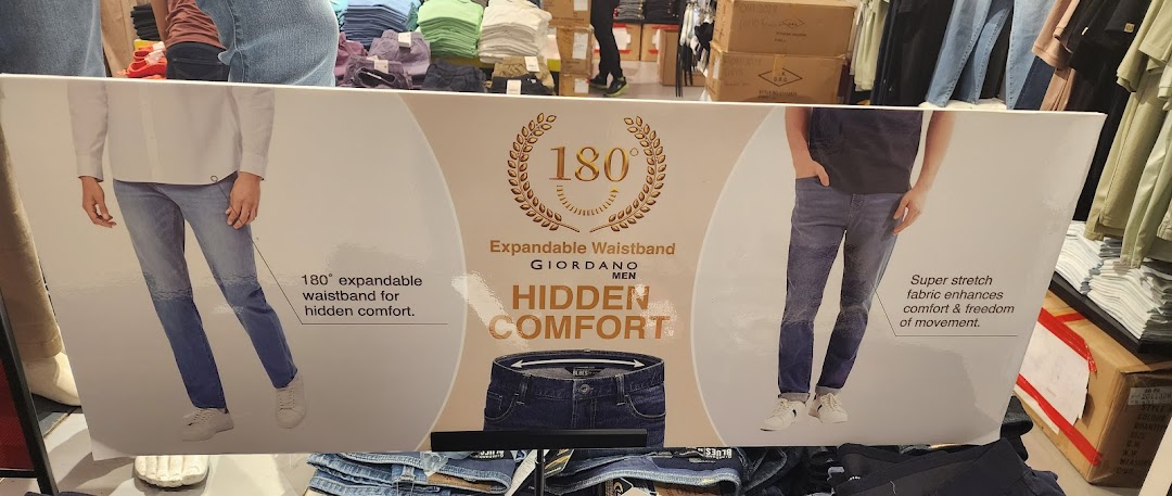 Promotional display for Giordano men's jeans highlighting expandable waistband and stretch fabric.