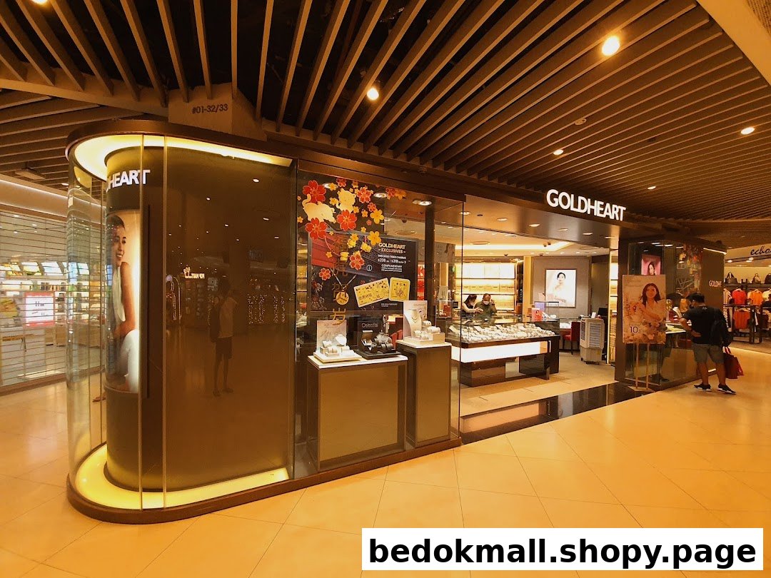 Goldheart Jewelry shop front with display windows and entrance in a mall.