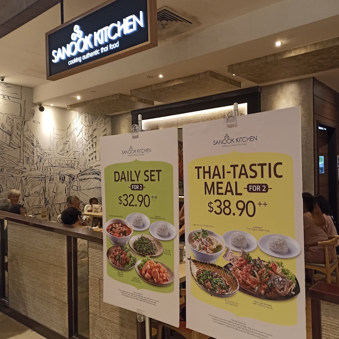 Two large promotional menus for a Thai restaurant with customers inside.