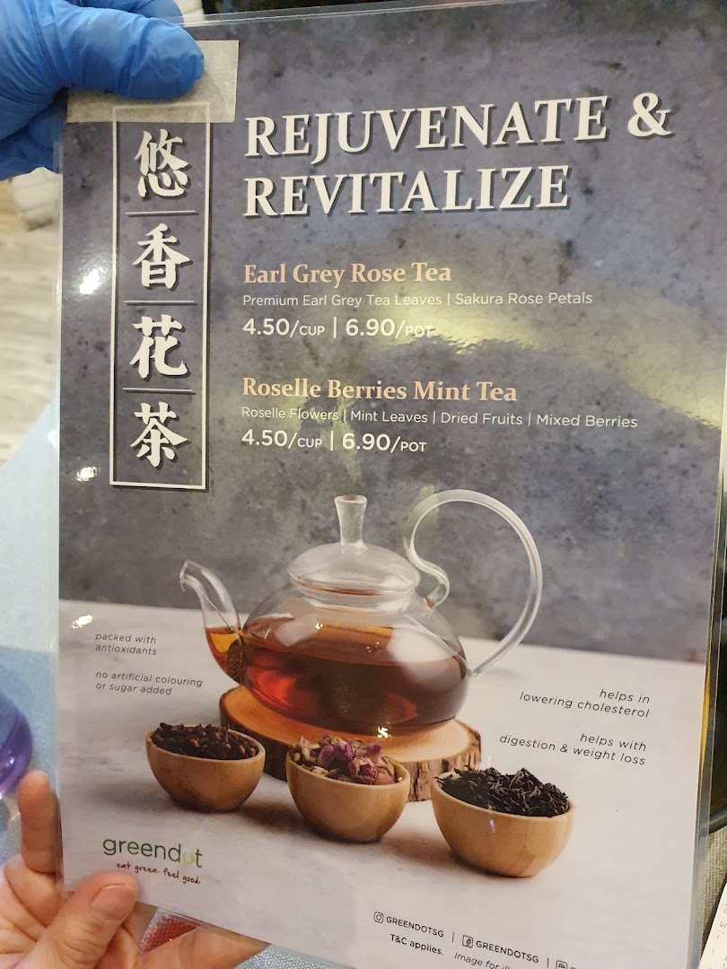 A menu displaying tea options, prices, and a teapot with ingredients.