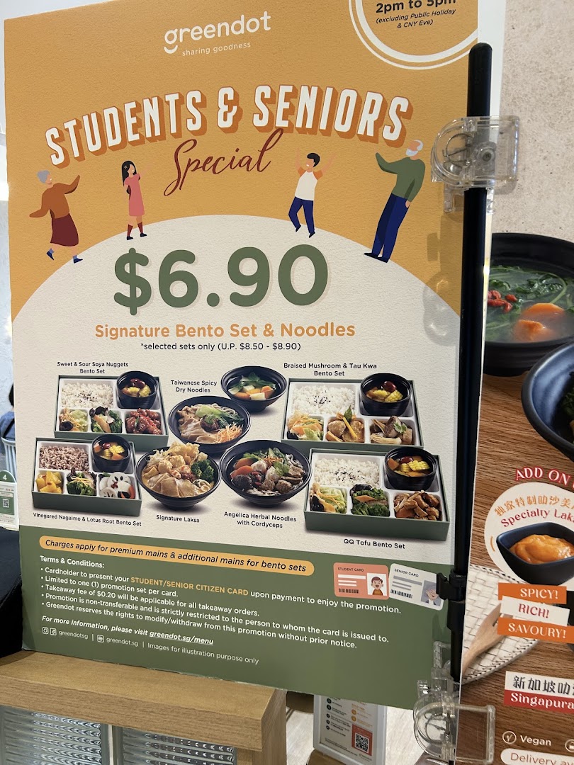 A promotional menu board displaying student and senior specials with food images.