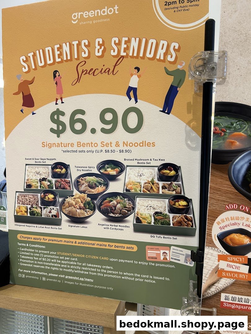 A promotional menu board displaying student and senior specials with food images.