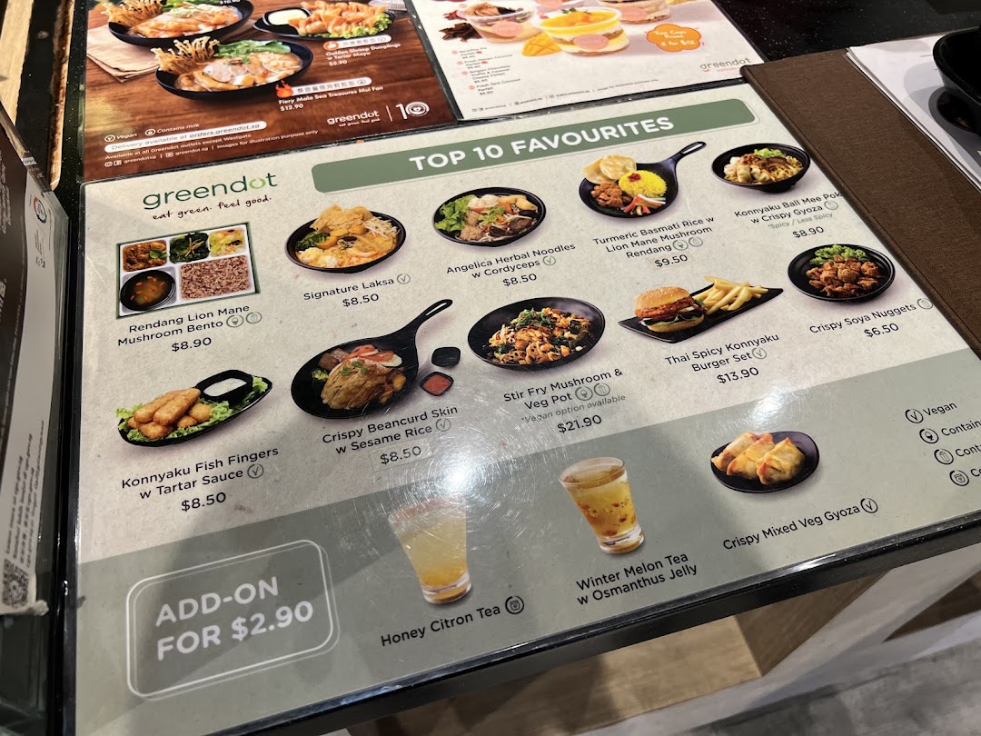 A close-up of a restaurant menu displaying various food items and prices.