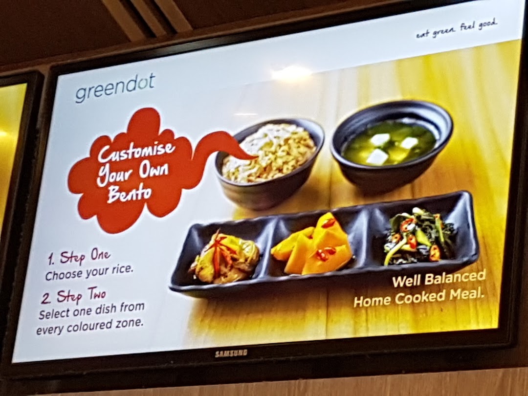 Digital screen showing a customizable bento menu with food images.