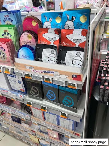 Close-up of a retail display featuring various beauty products and face masks.