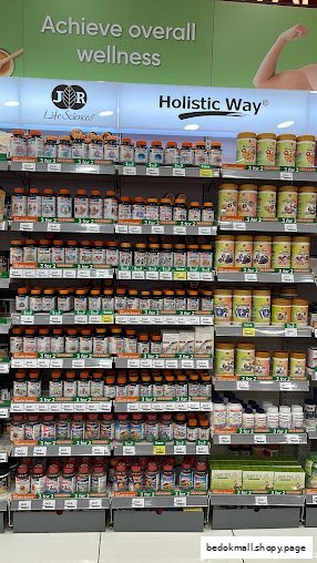 A retail shelf displaying various health supplements and wellness products.