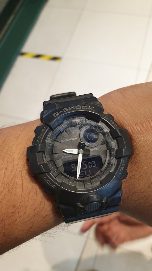 Close-up of a black G-Shock watch on a person's wrist.