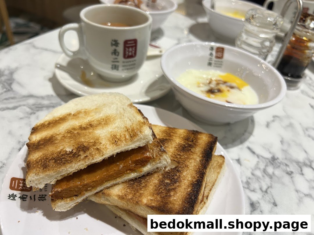 Toast, soft-boiled eggs, and a drink on a marble table.