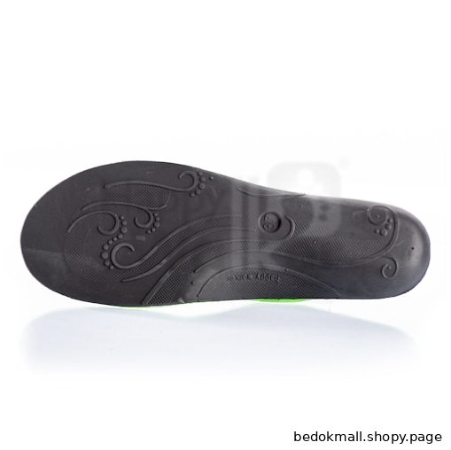 Close-up of a black shoe sole with decorative patterns.