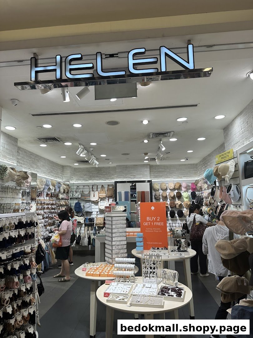 Interior view of Helen shop with customers browsing accessories and bags.
