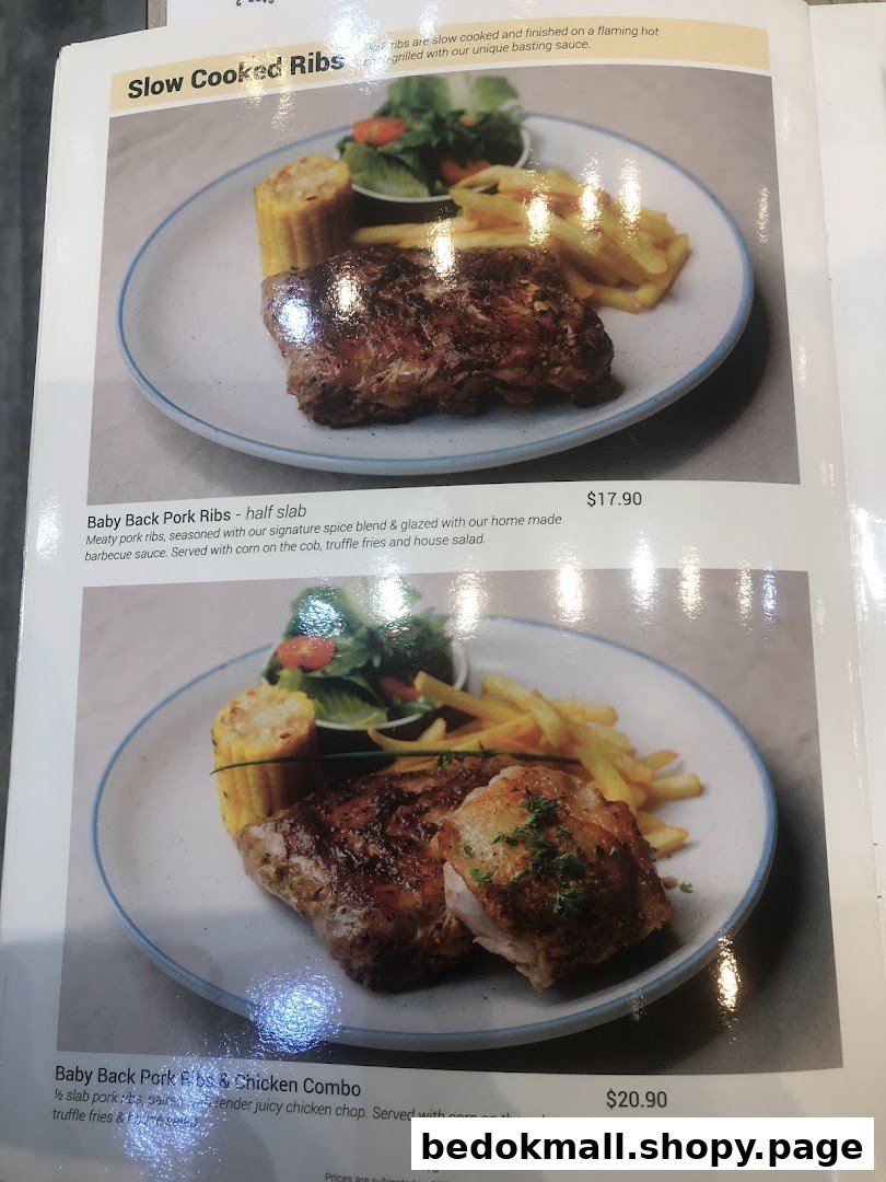 A menu page displaying rib and chicken dishes with prices.