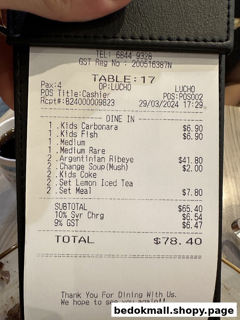 Close-up of a detailed dining receipt showing food items and total cost.