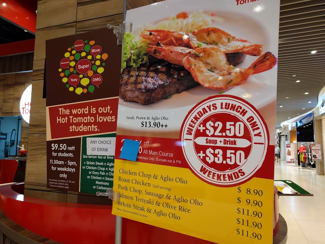 Large promotional signs display food items, prices, and deals for Hot Tomato Bistro.