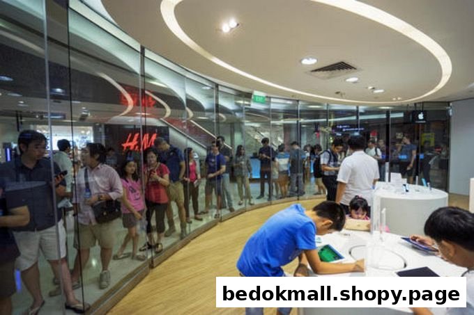 People browsing electronic devices inside a modern retail shop with a glass facade.