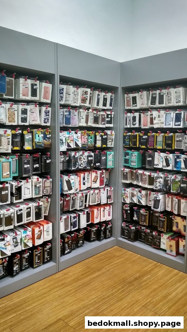Interior view of a shop displaying many phone cases and accessories on shelves.