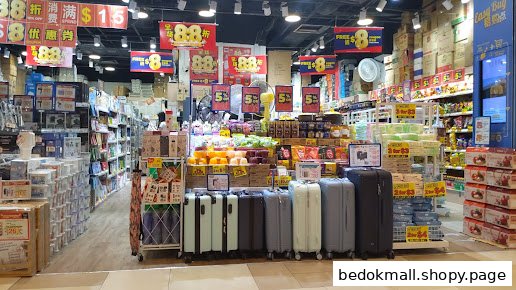 Interior of a retail store displaying various household goods and promotional offers.