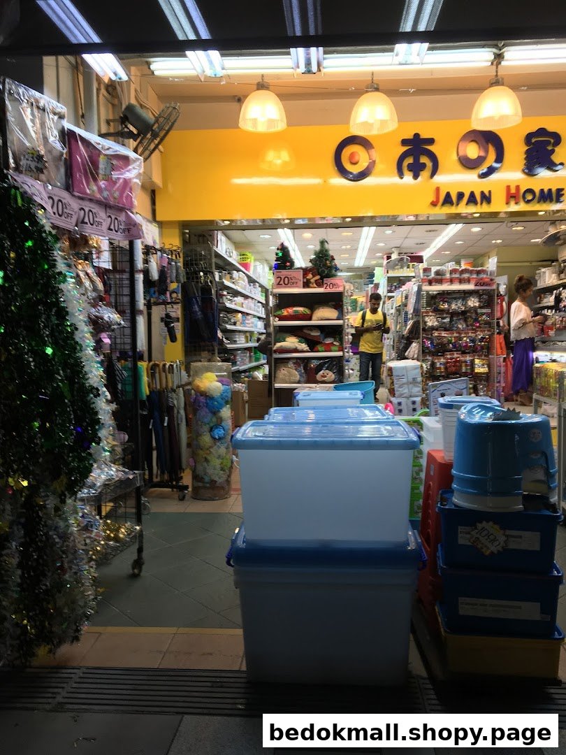 Shop entrance with signage, items displayed outside, and people inside.