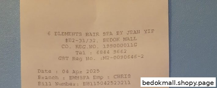 A close-up of a printed receipt or bill from a hair spa.