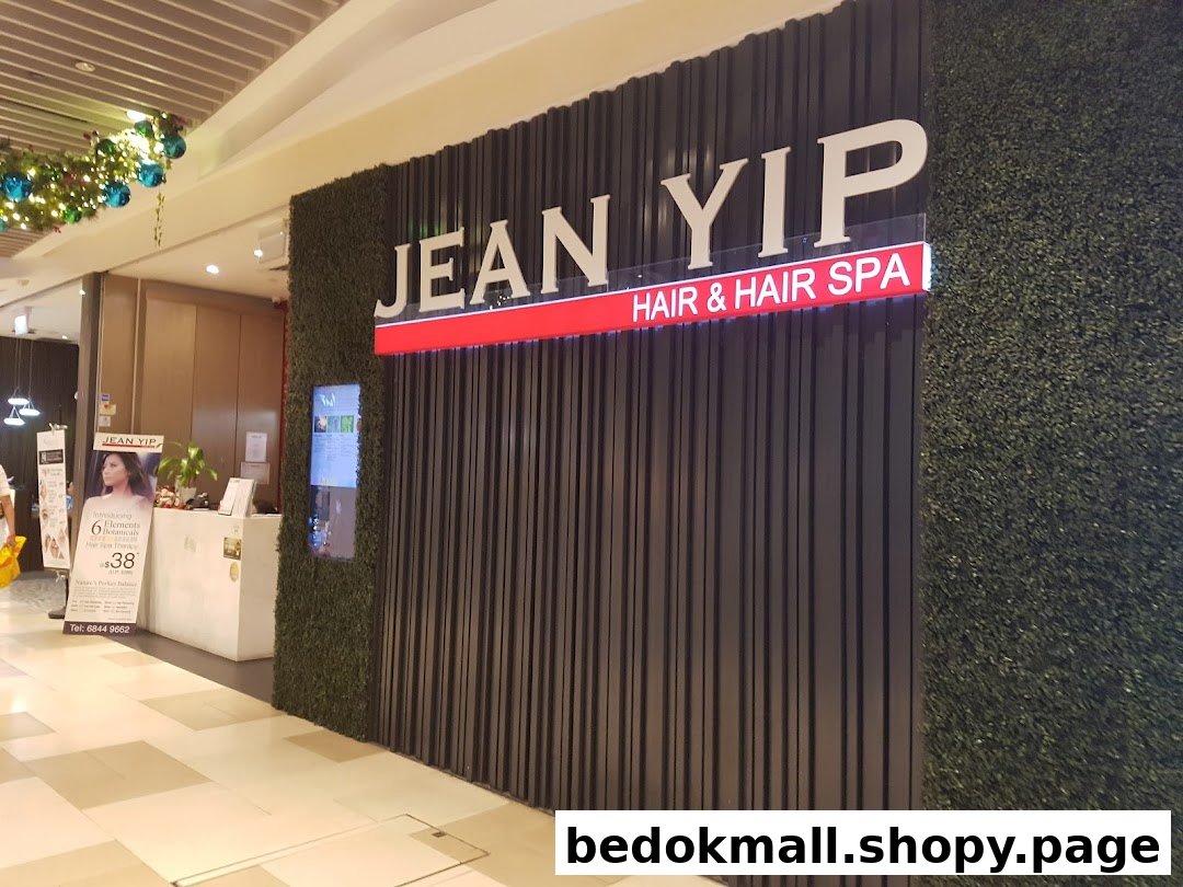 Exterior view of Jean Yip Hair & Hair Spa entrance with prominent signage.