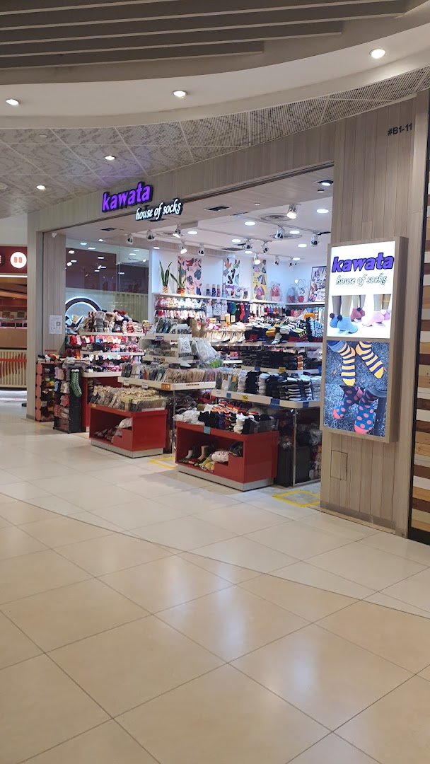 Shop front of Kawata House of Socks, displaying various socks inside.